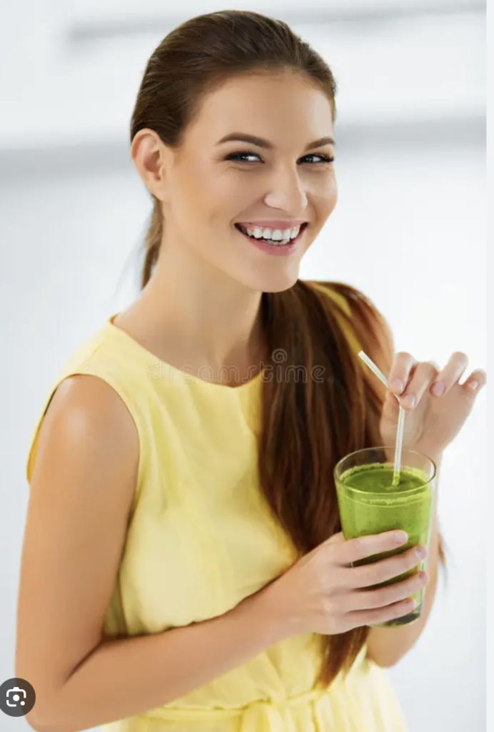 Woman Drinking Cleansing Green Juice