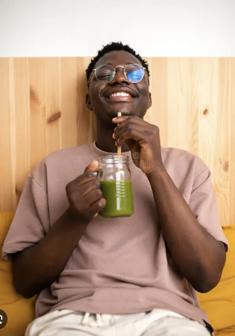 Man Drinking Cleansing Green Juice