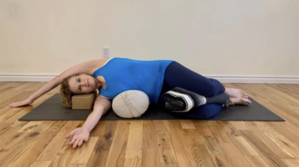 Yin Yoga Side Stretch with Bolster