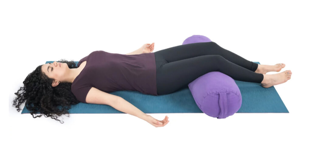 Yin Yoga Savasana with Bolster under Knees